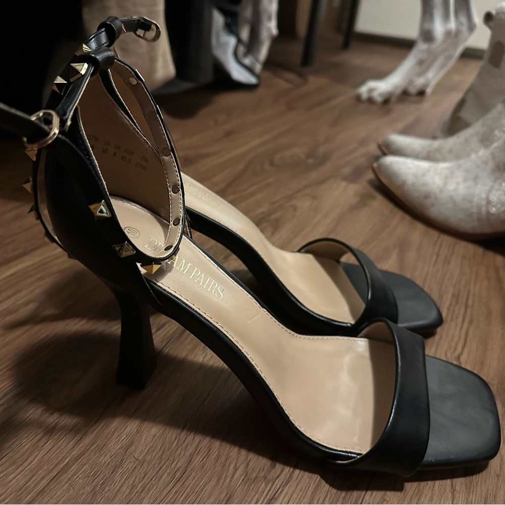 Strappy black and gold heels